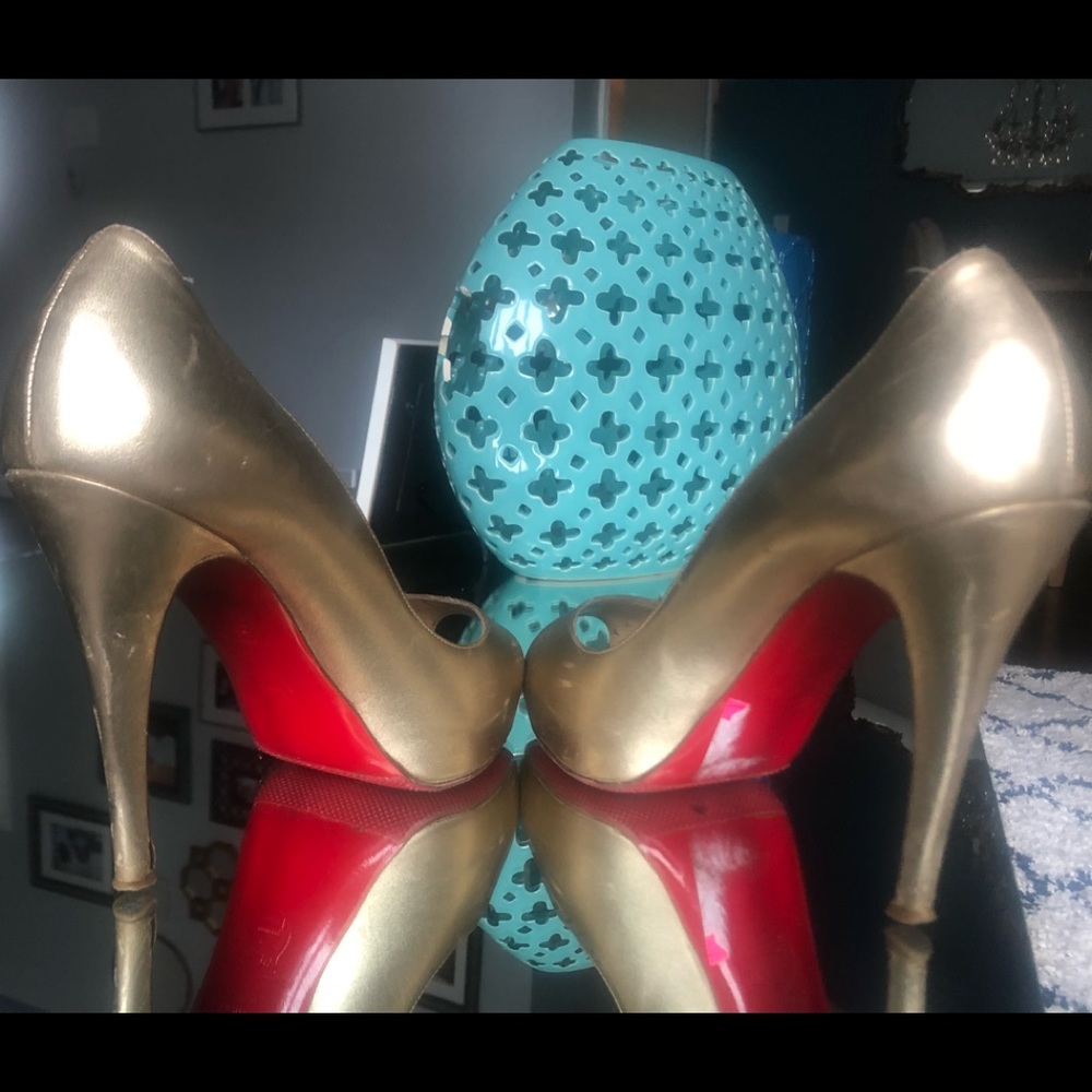 Gold Christian Louboutin shoes